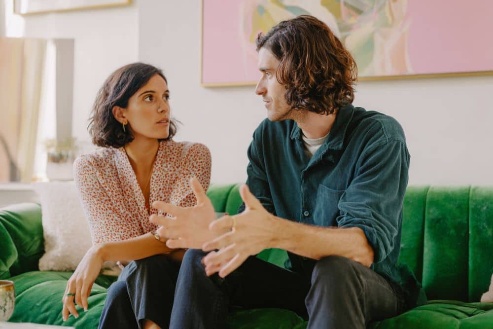 attractive couple having a conversation about weaponized incompetence