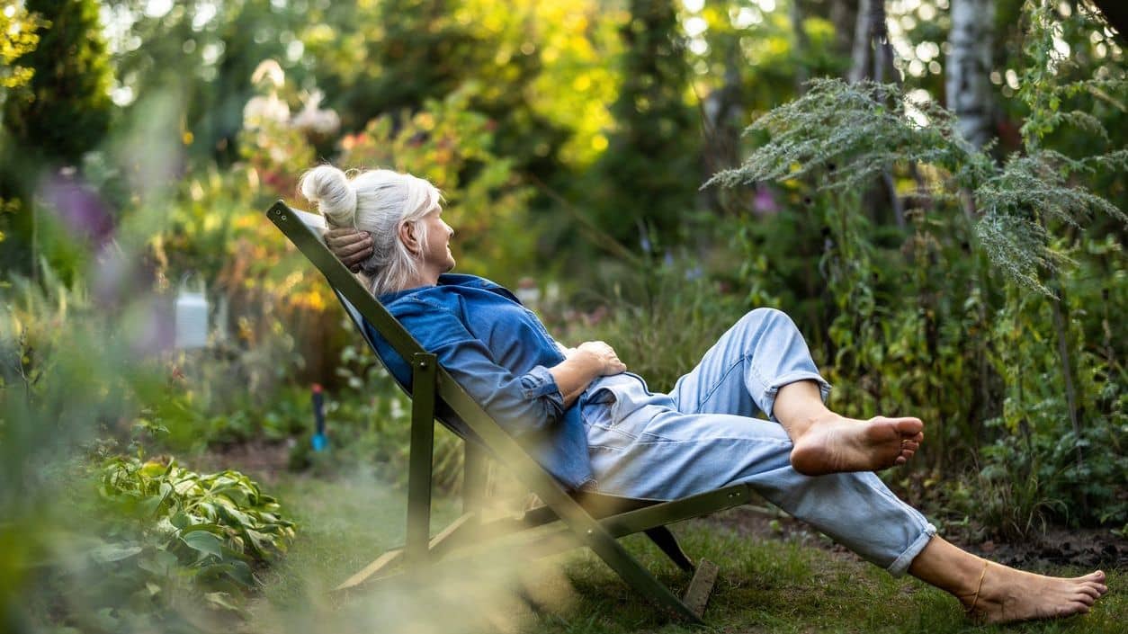 woman grounding outside in the morning for mental health